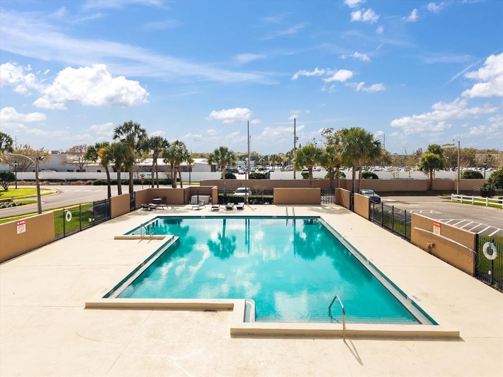 3374 Hamlet Loop Winter Park, FL 32792 - Photo 33 of 37 a view of a swimming pool with outdoor seating