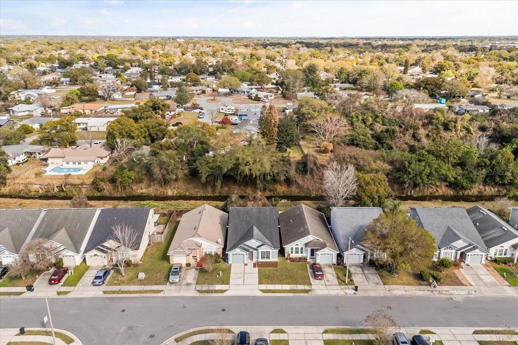 3374 Hamlet Loop Winter Park, FL 32792 - Photo 36 of 37 an aerial view of residential house with outdoor space
