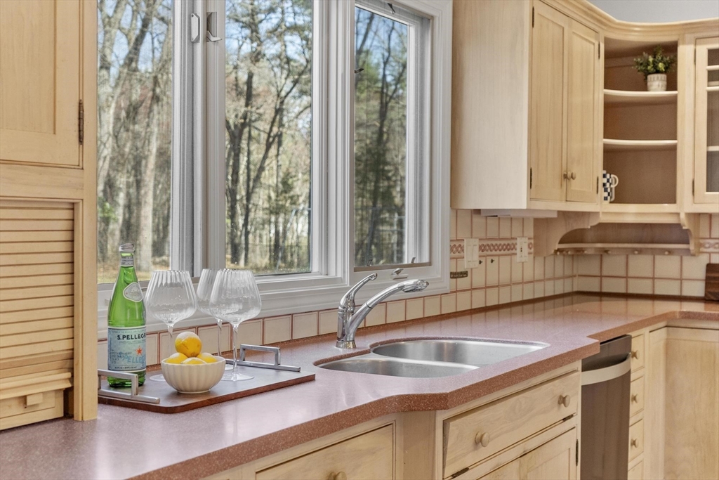 78 Cutters Ridge Road Carlisle, MA 01741 - Photo 12 of 42 a kitchen with a sink and a window