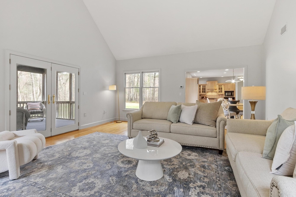 78 Cutters Ridge Road Carlisle, MA 01741 - Photo 19 of 42 a living room with furniture and a large window