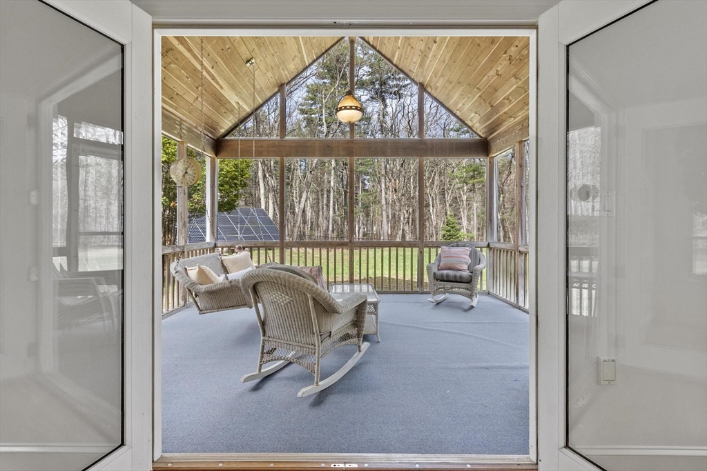 78 Cutters Ridge Road Carlisle, MA 01741 - Photo 20 of 42 a view of a livingroom with a couch and windows
