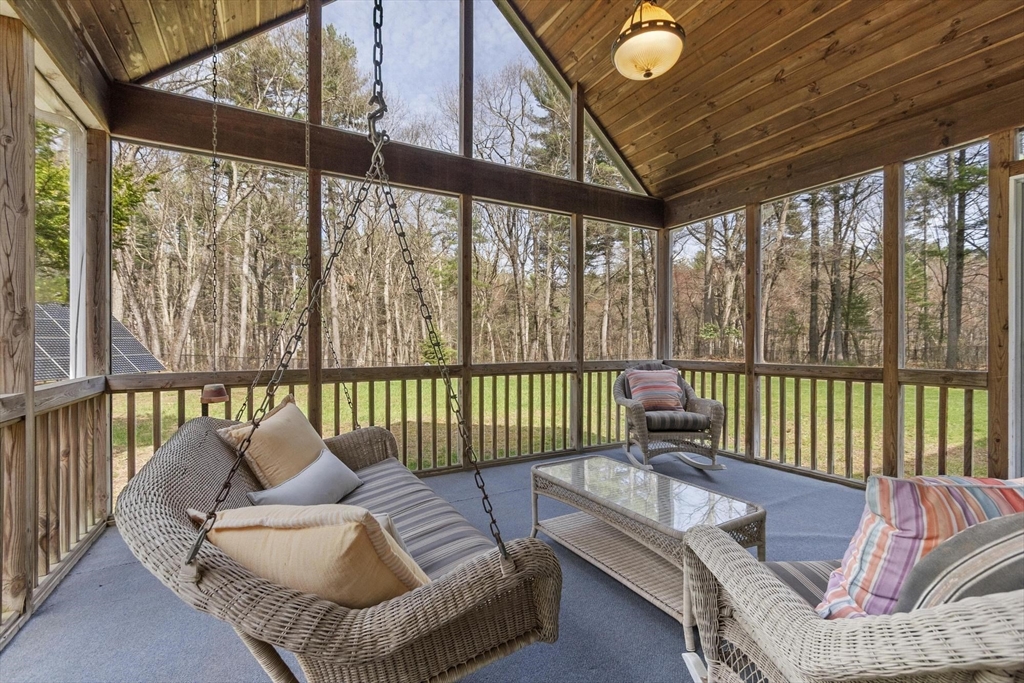 78 Cutters Ridge Road Carlisle, MA 01741 - Photo 21 of 42 a balcony with furniture and a large window