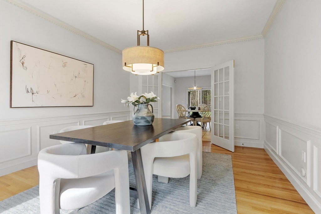 78 Cutters Ridge Road Carlisle, MA 01741 - Photo 7 of 42 a view of a dining room with furniture and wooden floor