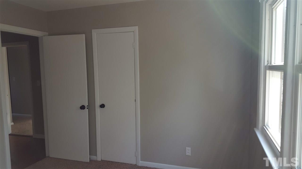 3232 Ward Road Raleigh, NC 27604 - Photo 14 of 22 a view of front door with hallway