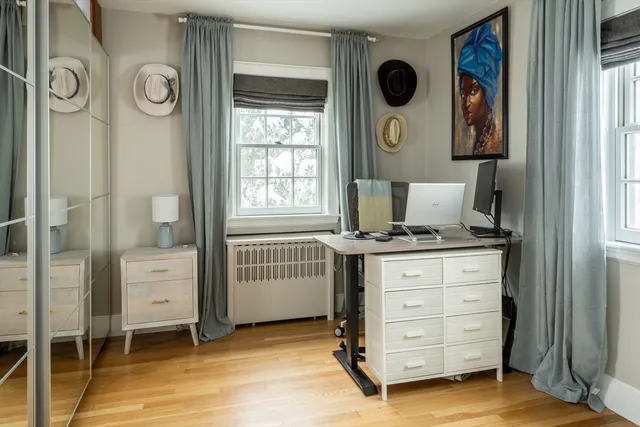 a room with furniture and a window