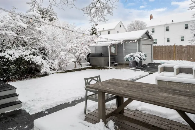 a view of a patio with furniture