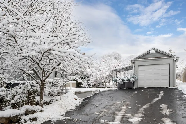 a view of a house with a snow