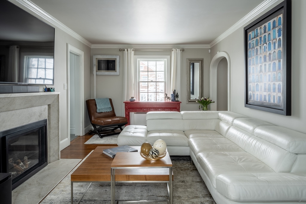 78 Howitt Road Boston, MA 02132 - Photo 7 of 20 a living room with furniture fireplace and window