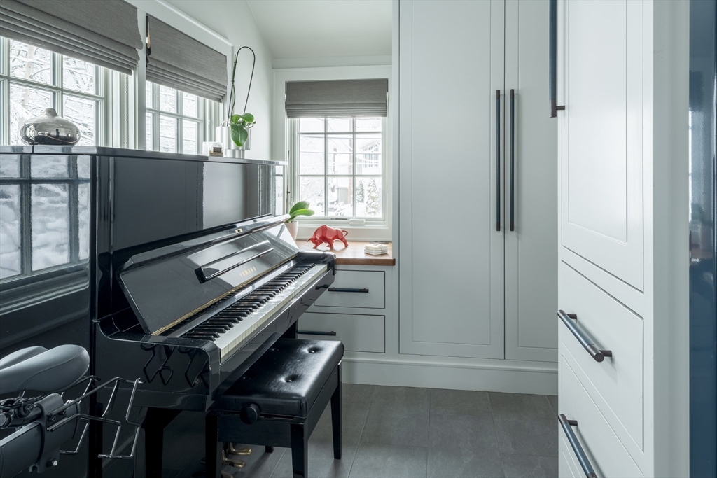 78 Howitt Road Boston, MA 02132 - Photo 9 of 20 a room with chairs and a window