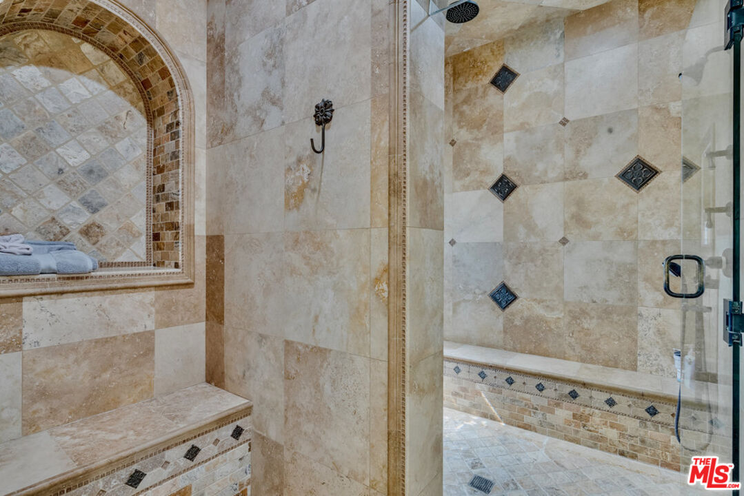 18000 Sunset Point Road Poway, CA 92064 - Photo 17 of 43 a bathroom with a shower