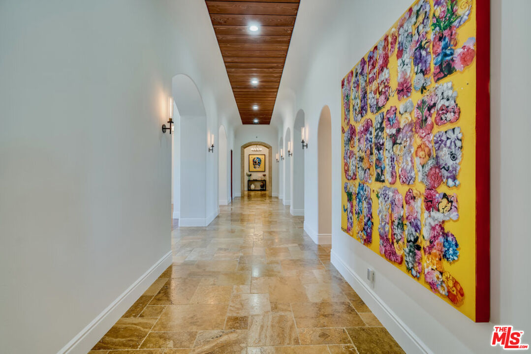 18000 Sunset Point Road Poway, CA 92064 - Photo 18 of 43 a view of entryway with a rug and a painting on the wall
