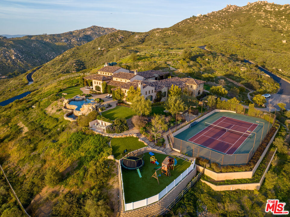 18000 Sunset Point Road Poway, CA 92064 - Photo 2 of 43 an aerial view of residential houses with outdoor space