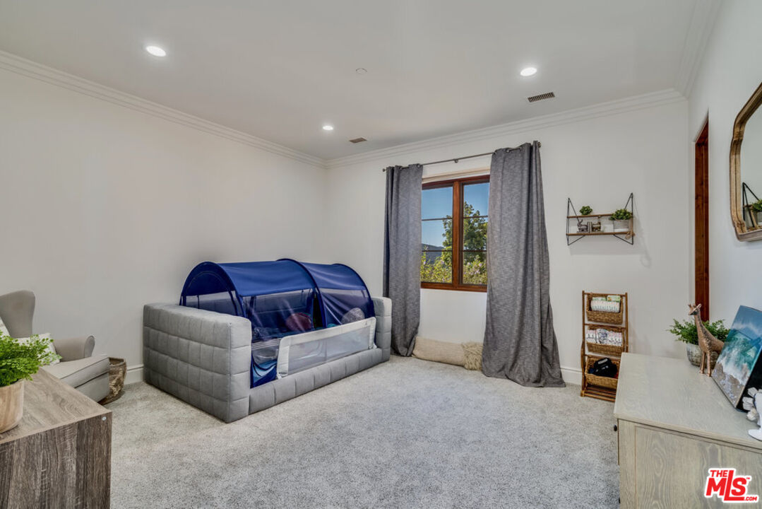 18000 Sunset Point Road Poway, CA 92064 - Photo 23 of 43 a living room with furniture and a couch