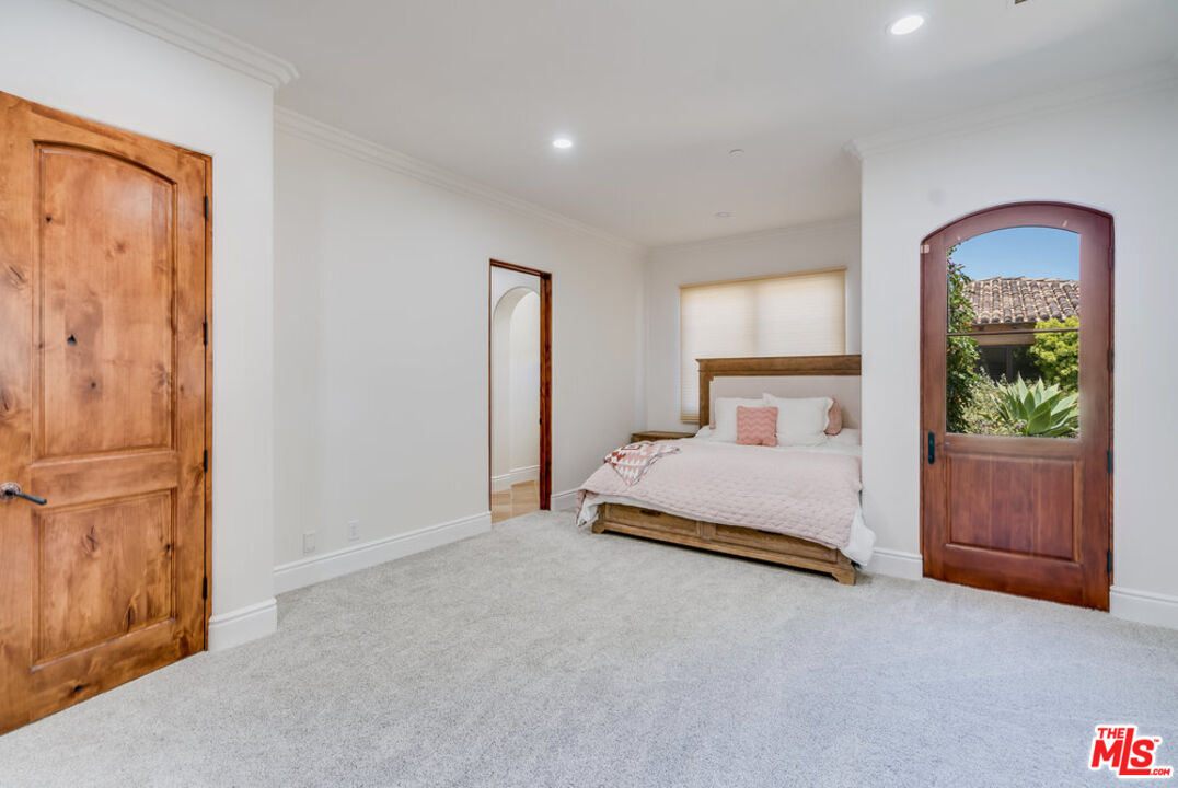 18000 Sunset Point Road Poway, CA 92064 - Photo 25 of 43 a bedroom with a bed and a dresser