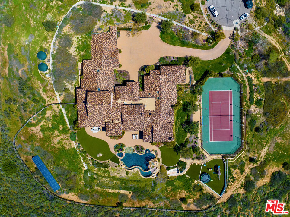 18000 Sunset Point Road Poway, CA 92064 - Photo 31 of 43 an aerial view of a house with a yard and large trees