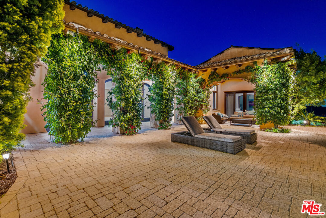 18000 Sunset Point Road Poway, CA 92064 - Photo 36 of 43 a view of a house with backyard and sitting area
