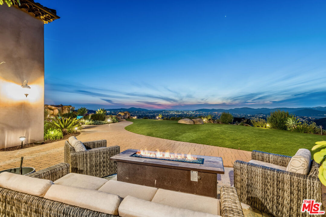 18000 Sunset Point Road Poway, CA 92064 - Photo 37 of 43 a view of swimming pool and outdoor seating
