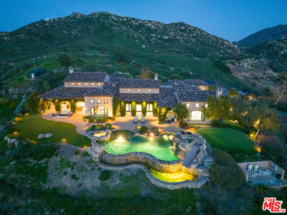 18000 Sunset Point Road Poway, CA 92064 - Photo 43 of 43 an aerial view of a house with swimming pool and a yard