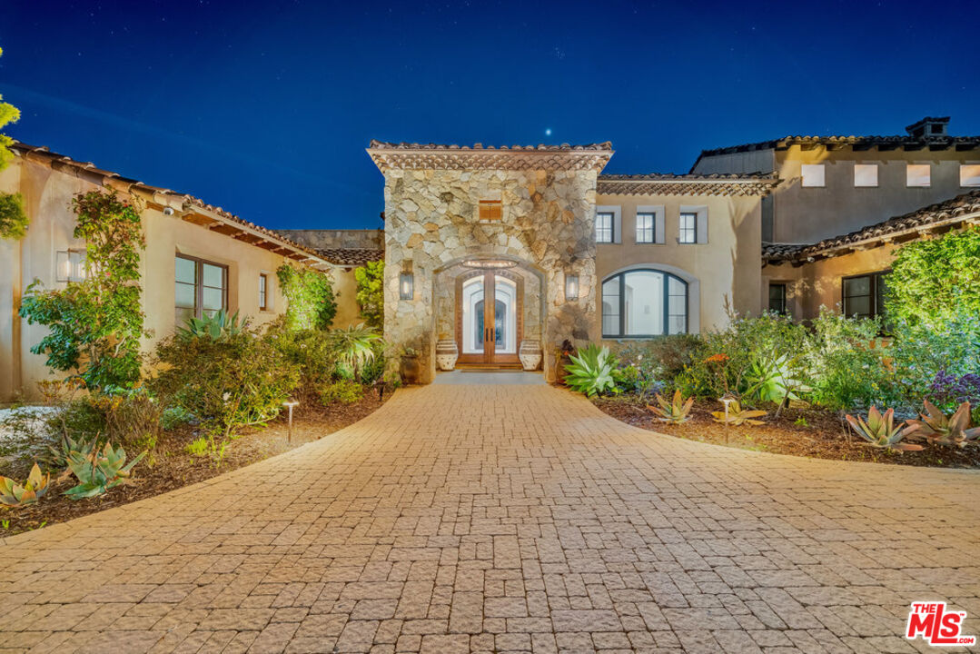 18000 Sunset Point Road Poway, CA 92064 - Photo 5 of 43 a front view of a house with garden