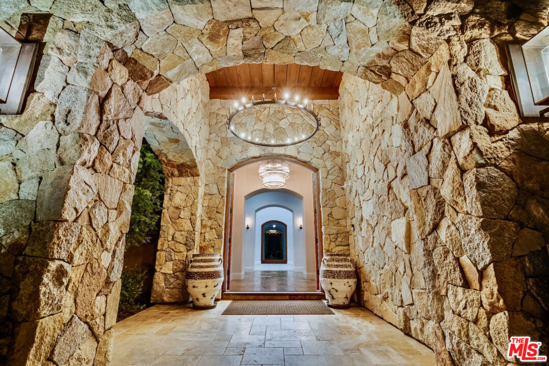 18000 Sunset Point Road Poway, CA 92064 - Photo 6 of 43 a view of a fireplace with a sink