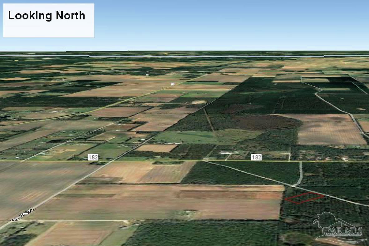 9209 Sage Frst Lane Pace, FL 32571 - Photo 24 of 26 a view of an ocean and beach