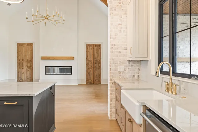 $929,000 | 309 Sunset Palm Court, Youngsville, LA 70592