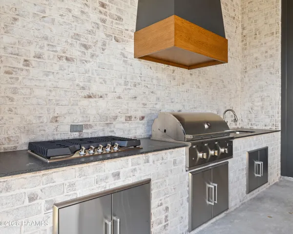 $929,000 | 309 Sunset Palm Court, Youngsville, LA 70592