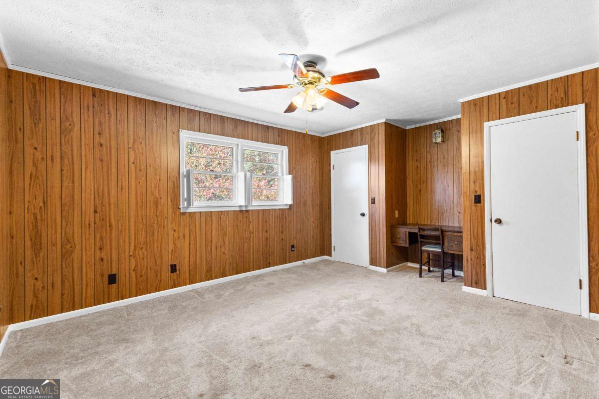 2540 Hannahs Mill Road Thomaston, GA 30286 - Photo 18 of 76 a view of an empty room with a window