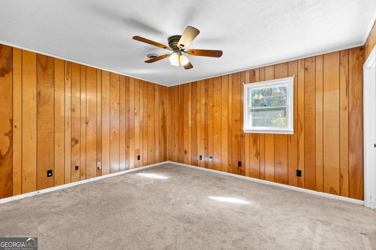 2540 Hannahs Mill Road Thomaston, GA 30286 - Photo 26 of 76 a view of an empty room with a window