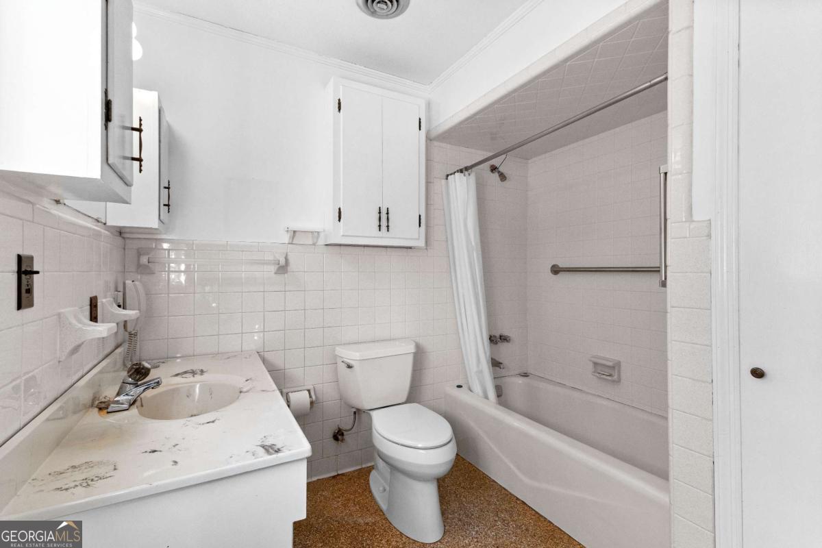 2540 Hannahs Mill Road Thomaston, GA 30286 - Photo 29 of 76 a bathroom with a sink toilet and shower