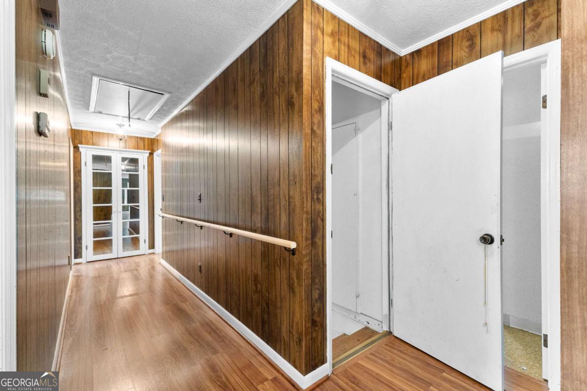 2540 Hannahs Mill Road Thomaston, GA 30286 - Photo 31 of 76 a view of hallway with wooden floor
