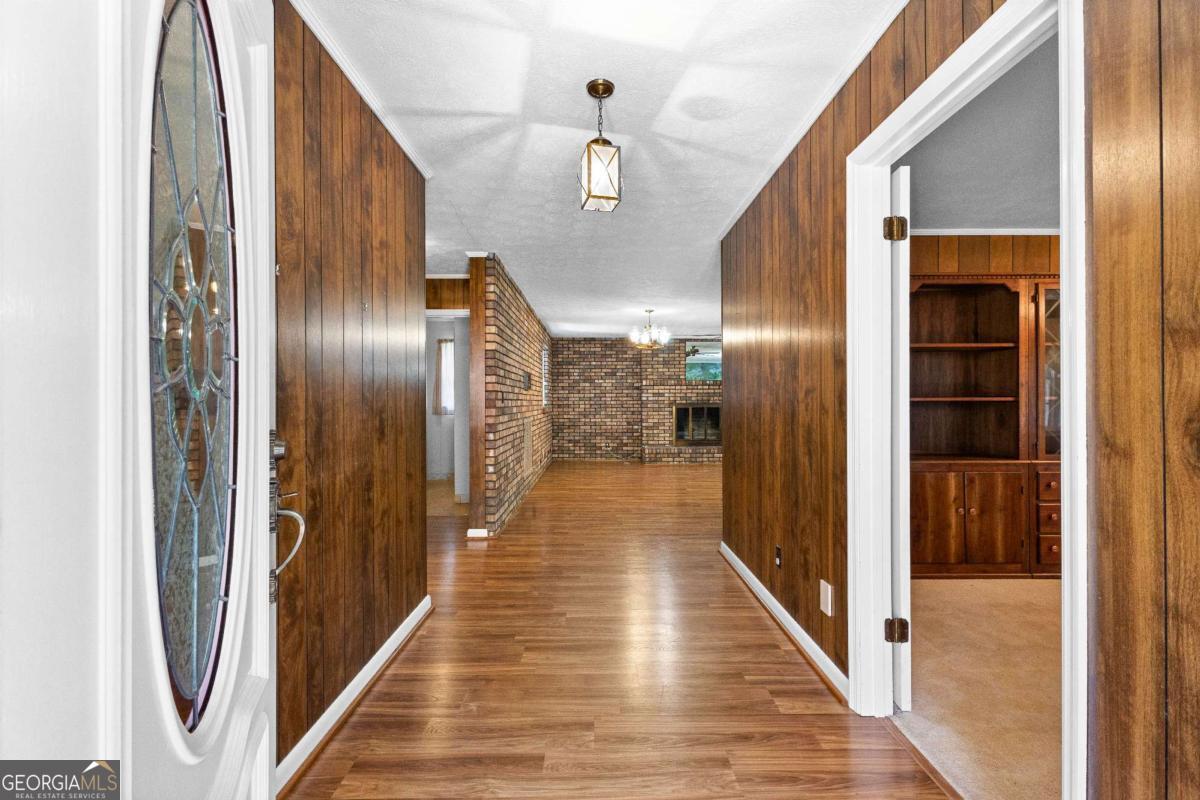 2540 Hannahs Mill Road Thomaston, GA 30286 - Photo 5 of 76 a view of hallway with wooden floor