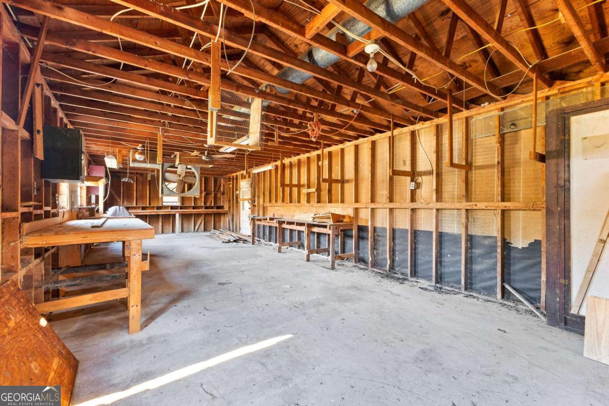 2540 Hannahs Mill Road Thomaston, GA 30286 - Photo 53 of 76 a view of an empty room with wooden walls