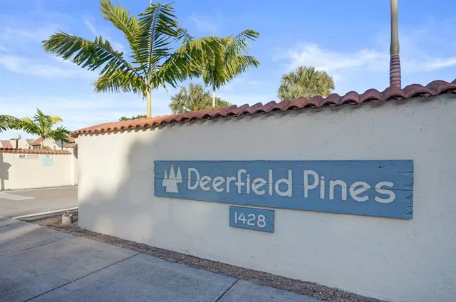 a view of a street with a building in the background