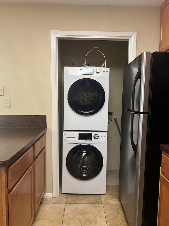 806 West 24th Street, Unit 121 Austin, TX 78705 - Photo 5 of 9 a utility room with dryer and washer