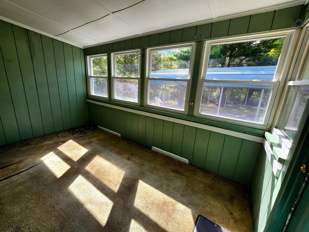 117 High Street Freetown, MA 02702 - Photo 7 of 18 a view of an empty room with a window