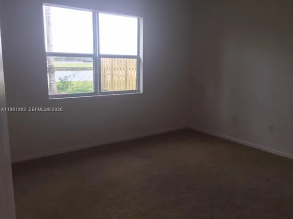 an empty room with a window