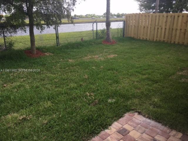 11842 Southwest 253rd Terrace Homestead, FL 33032 - Photo 5 of 15 a view of backyard with tree