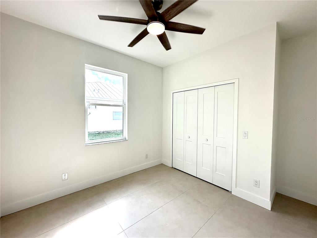 26129 Northern Cross Road Punta Gorda, FL 33983 - Photo 23 of 40 a view of an empty room with a window