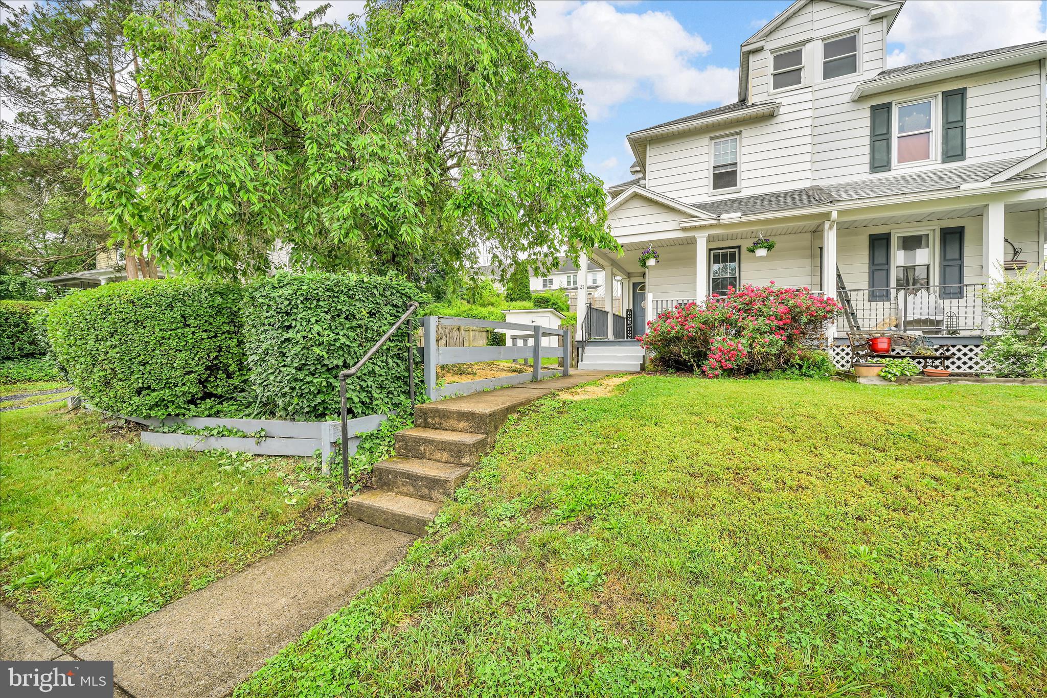 121 East Cumberland Road Enola, PA 17025 - Photo 27 of 27 a view of house in front of a big yard with potted plants and large trees