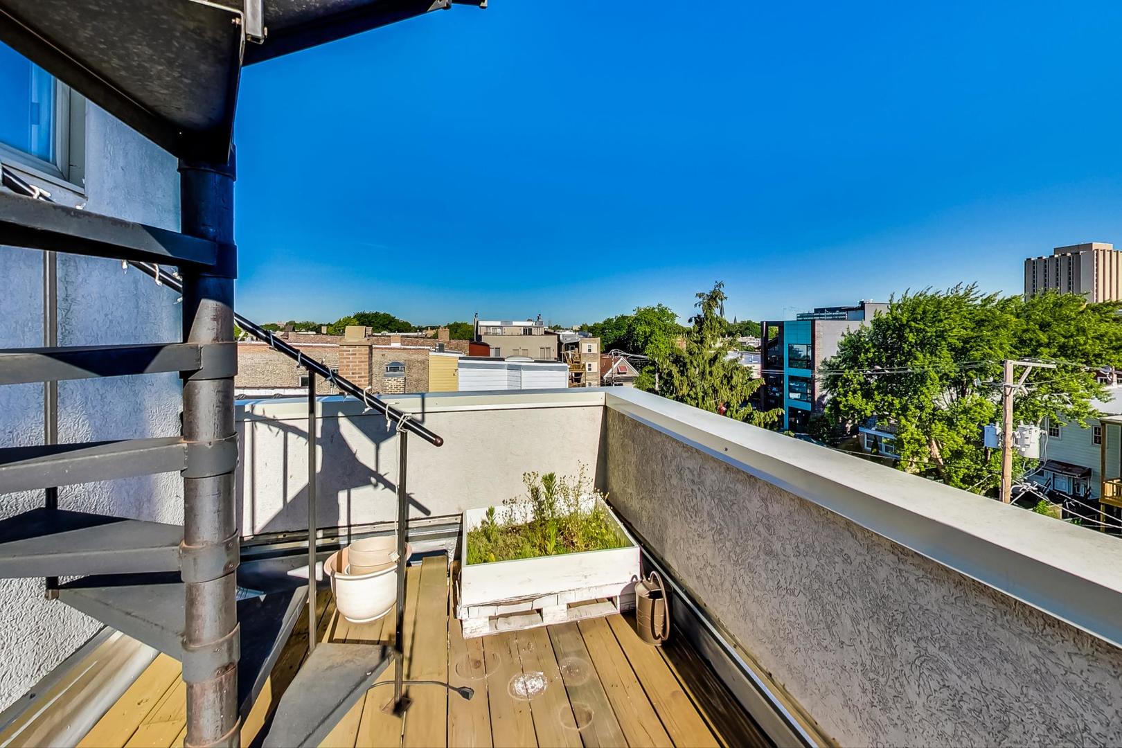 2128 West Walton Street, Unit 3W Chicago, IL 60622 - Photo 18 of 25 a view of balcony with wooden floor and seating space