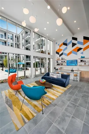 an outdoor living space with patio furniture and a fireplace