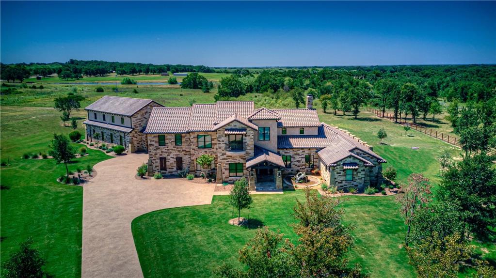 2067 Doss Road Millsap, TX 76066 - Photo 1 of 1 an aerial view of a house with garden space and street view
