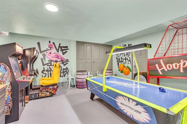 a view of a kitchen with stove and cabinets