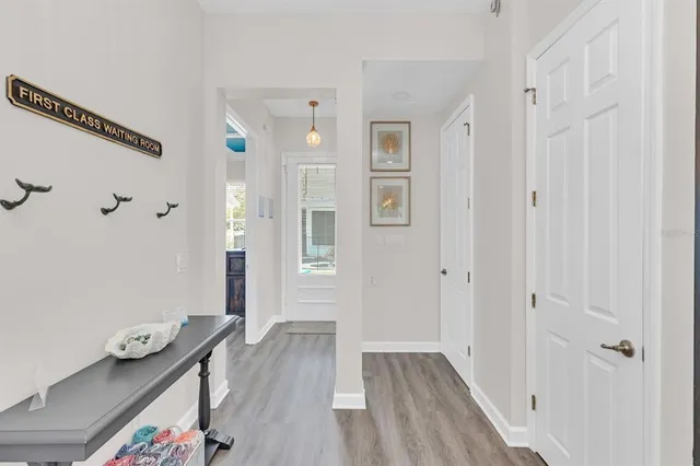 a view of a chairs and table in the backyard