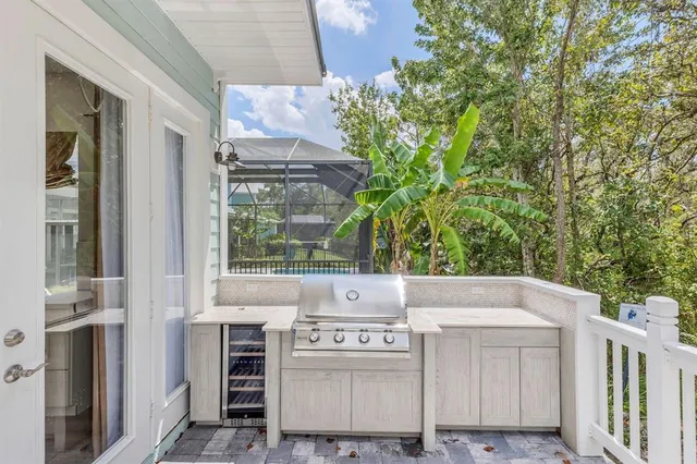 a view of a swimming pool with a table and chairs