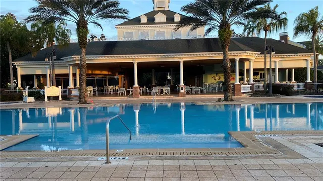 a view of a swimming pool with a garden