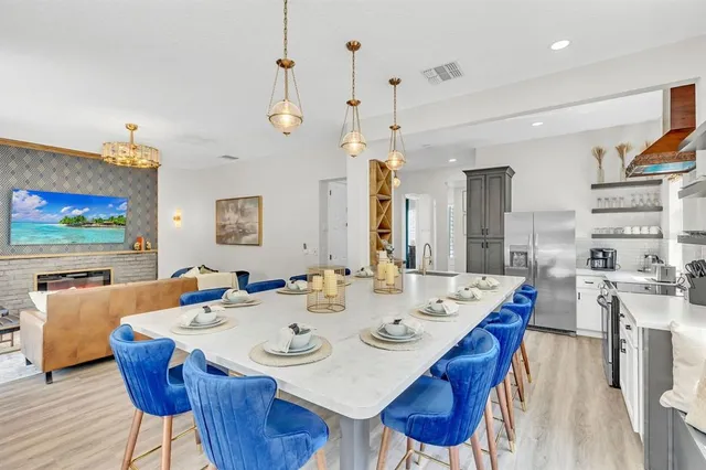 a living room with furniture a rug and a window