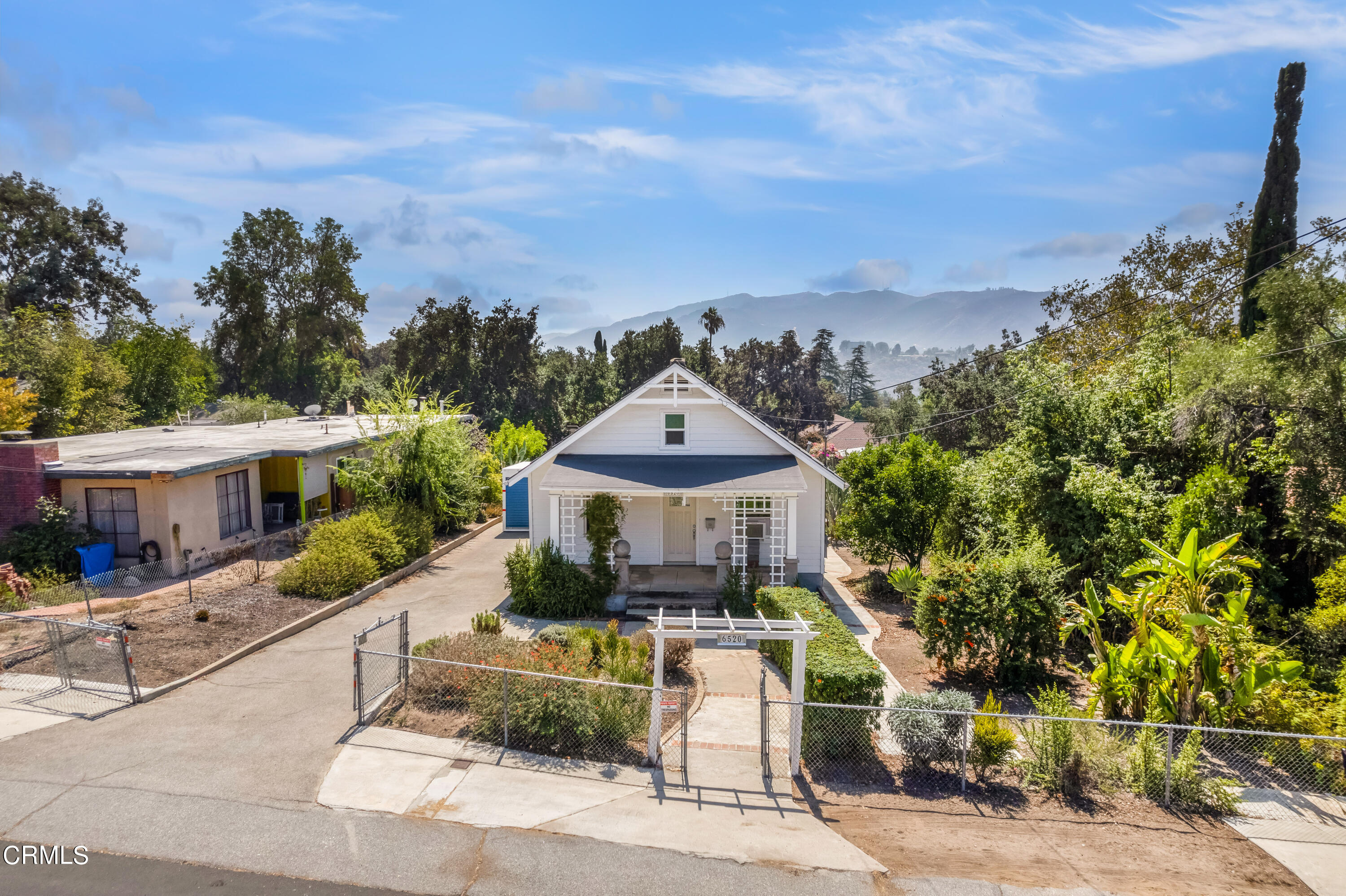 6520 Valmont Street Tujunga, CA 91042 - Photo 1 of 35 a front view of a house with a yard