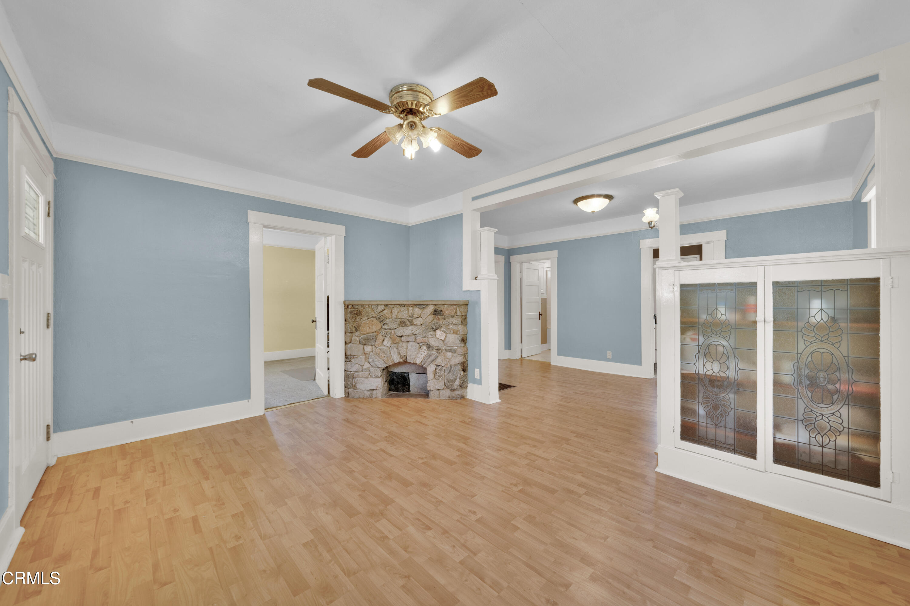 6520 Valmont Street Tujunga, CA 91042 - Photo 12 of 35 a view of an empty room with window and wooden floor